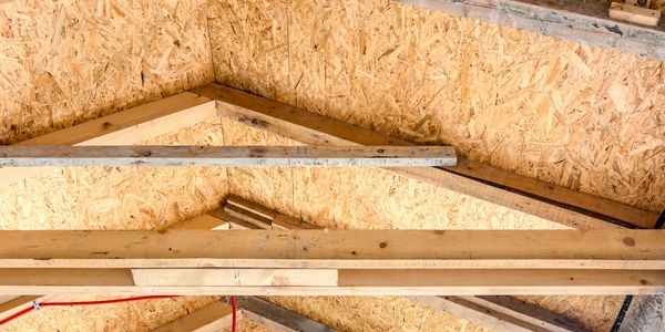 Wooden and steel bars under a roof