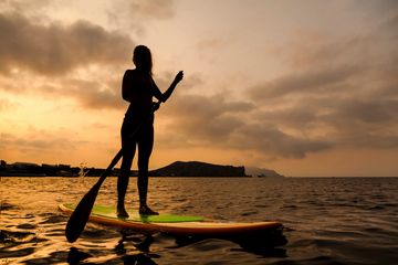 Person on a stand up paddle board