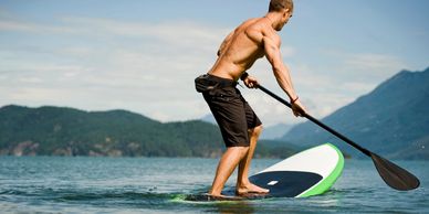 Man standing on a paddle board