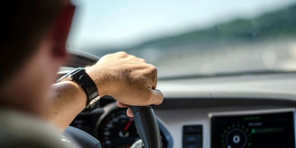 A man driving a car