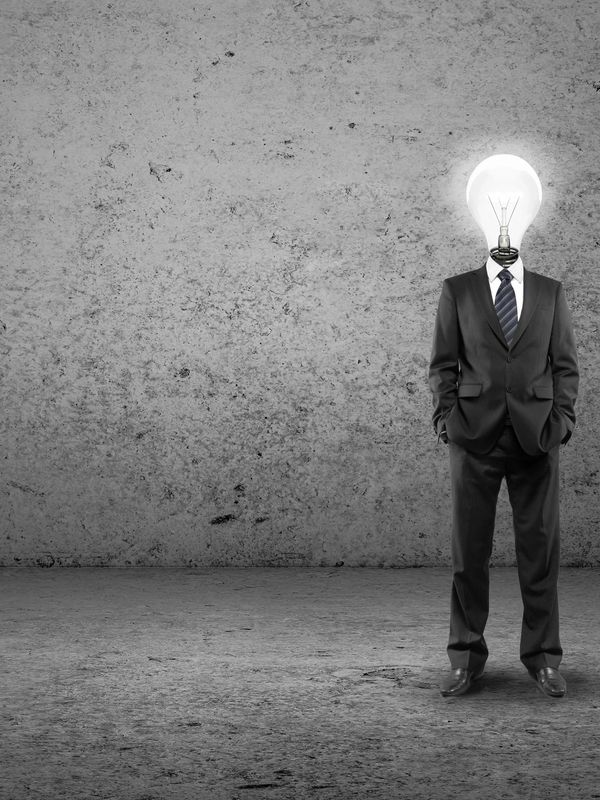 A man with a light bulb as a head
