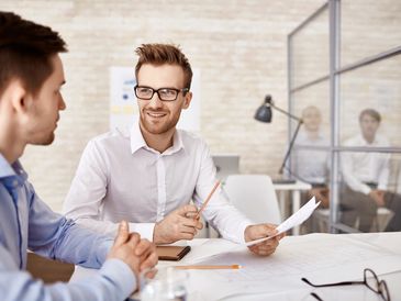 Business people having a private meeting for mentoring