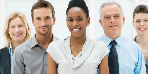 a group of smiling people