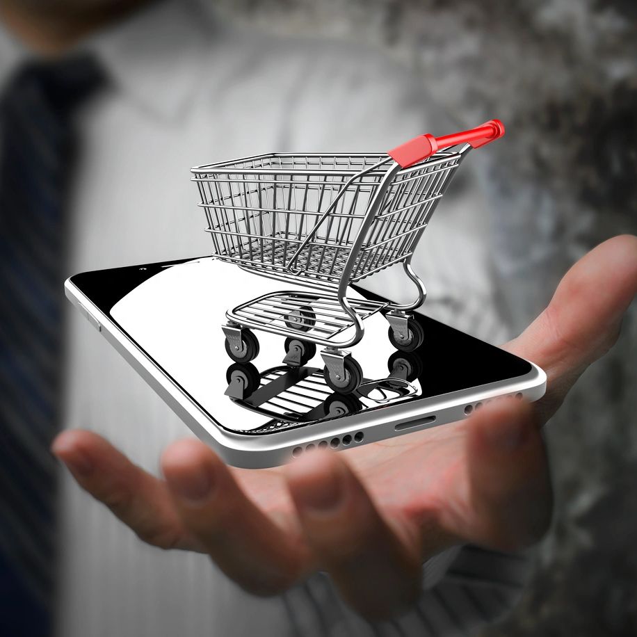 Shopping cart on a smartphone symbolizing online shopping.