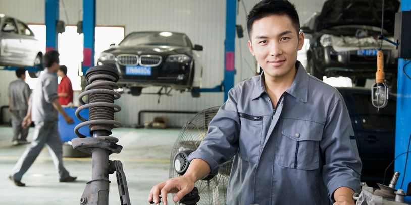 Mechanic doing car repairs