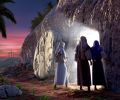 Nativity scene depicting Mary, Joseph, and angel at night.