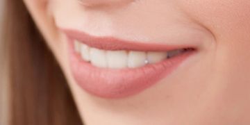 lady smiling with permanent lip blushing and powder brows