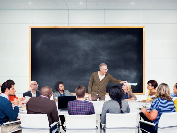 Group of people in a training session.