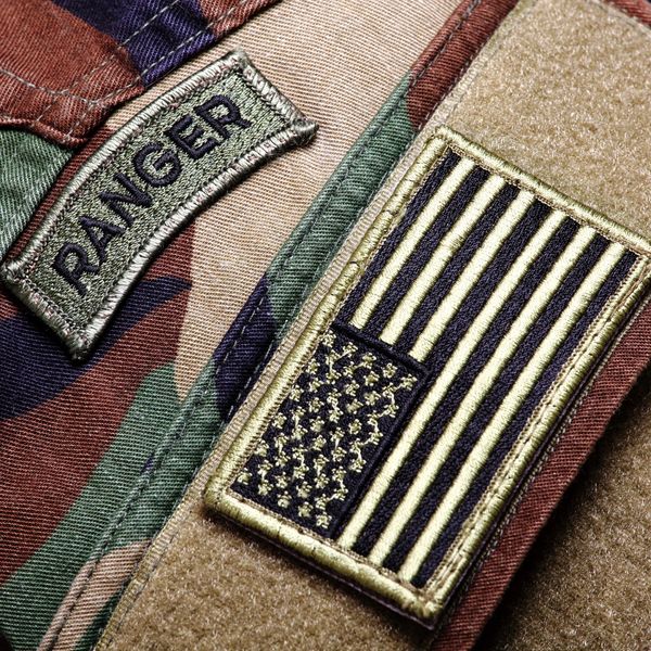 Ranger Tab on Soldier Uniform with American Flag