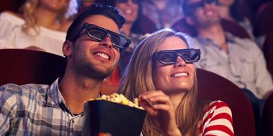 Man woman wearing eyeglass and drinking cinema screen