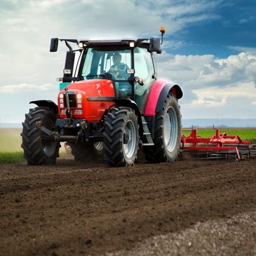 Tractor preparing land for planting