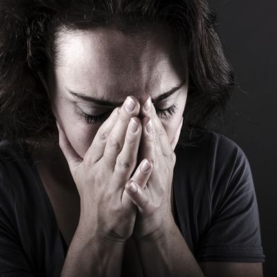 Woman experiencing depression and seeking out depression therapy services in Ontario