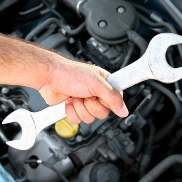 Technician holding a spanner