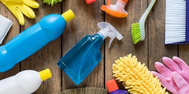 cleaning bottles and cleaning brushes dusing
