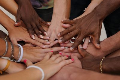 Hands from different cultures. 