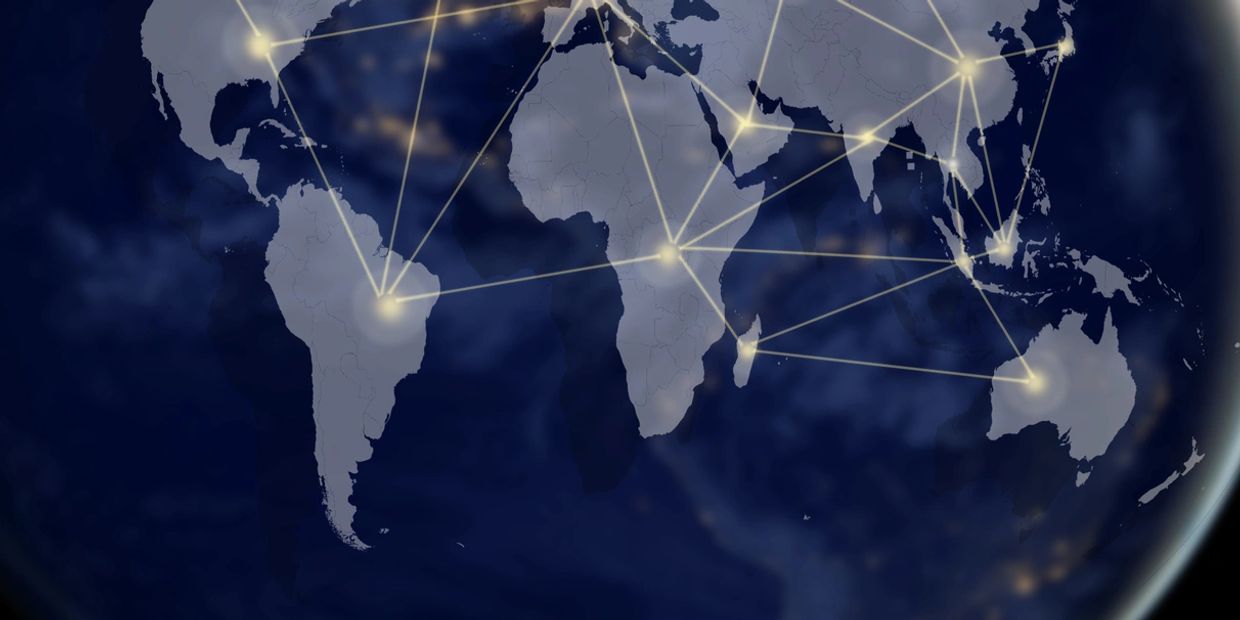Global network connections linking continents with glowing nodes and lines.