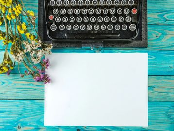 Typewriter, blue background