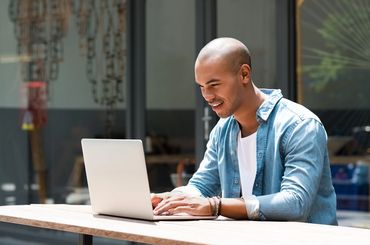 determined man working on his laptop