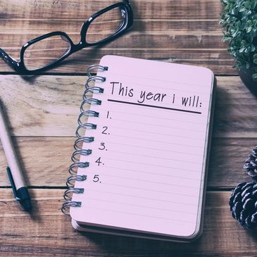 An open notebook made for writing goals