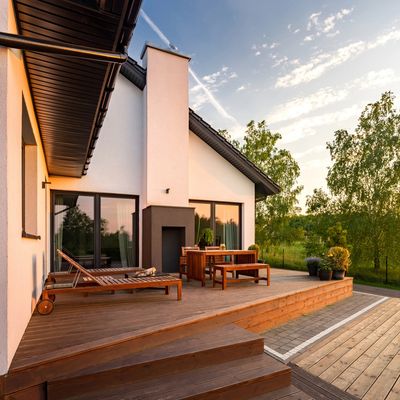 Stunning contemporary stucco home with gorgeous deck elevated four feet from ground level,