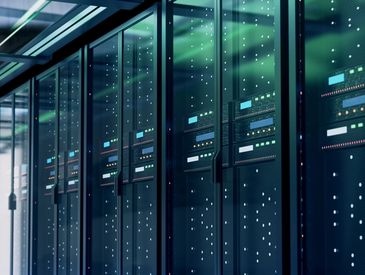 Row of high-tech server racks in a data center.