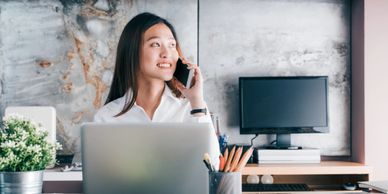 smiling lady on phone