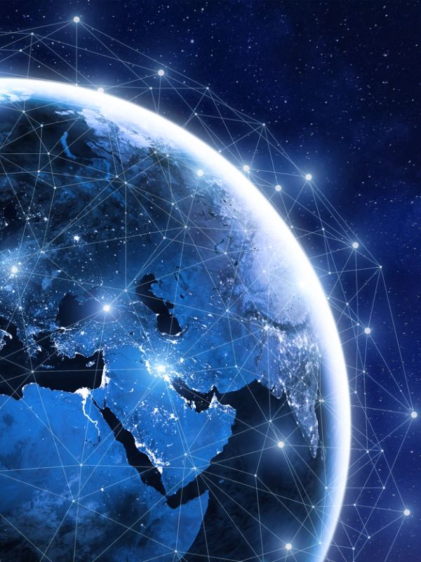 Earth from space with a glowing network connecting major regions.