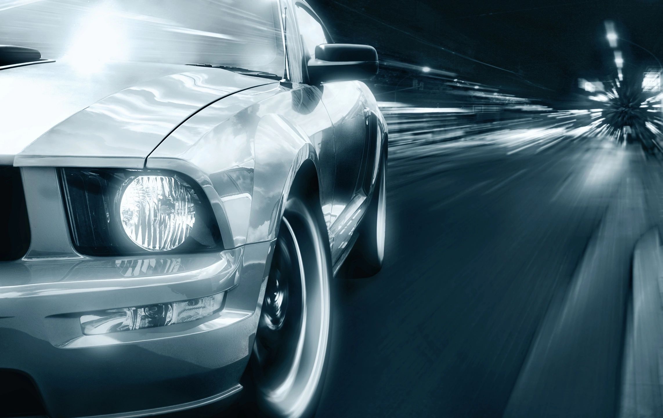 sepia tone car with blurred lights 