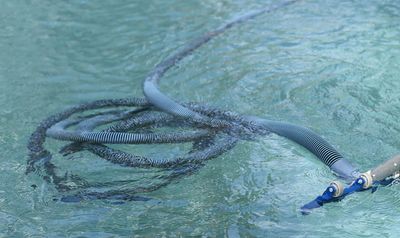 Underwater pipeline with marine growth.