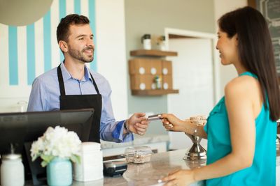 Customer checking at restaurant