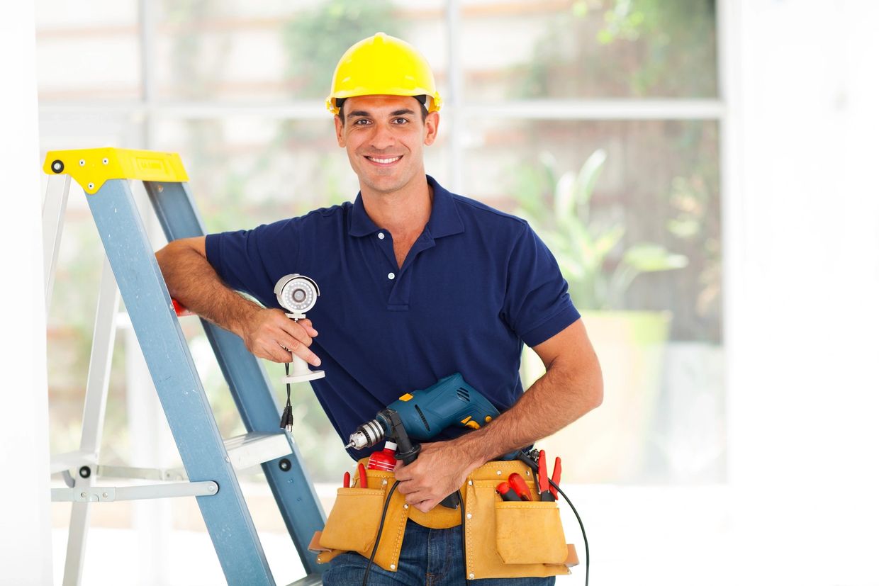 handymen stand with tools