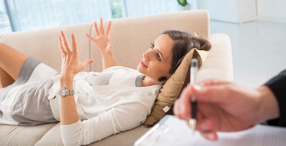 Woman on a couch getting counseling.