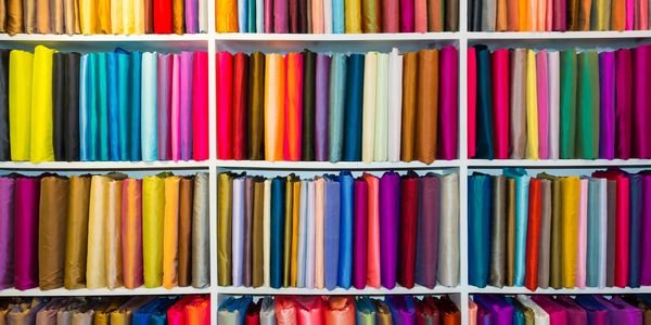 Shelves filled with colorful cotton quilting fabric