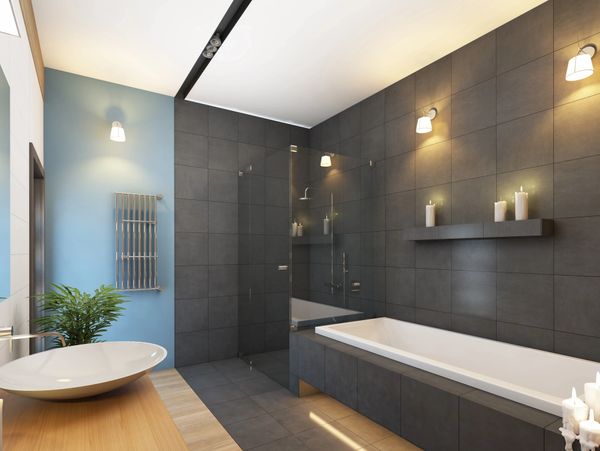 Modern bathroom with dark tiles, wooden countertop, and ambient lighting.