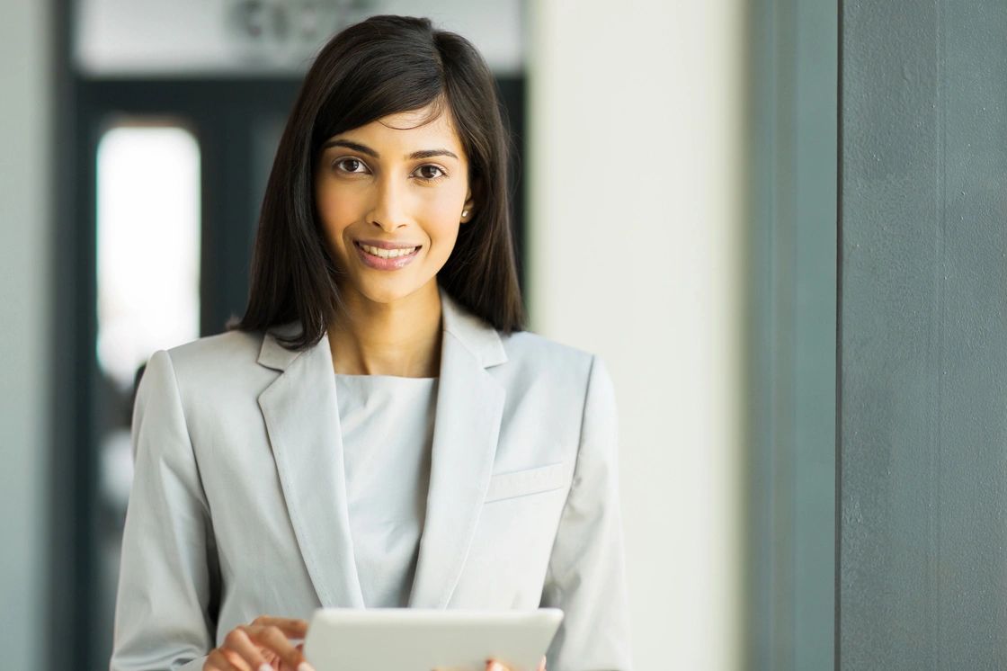 IT Consulting
Woman holding tablet image.

