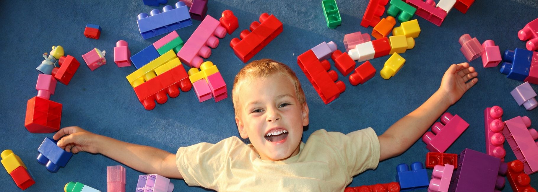 Child playing with LEGO
