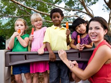 Children eating ice cream outside