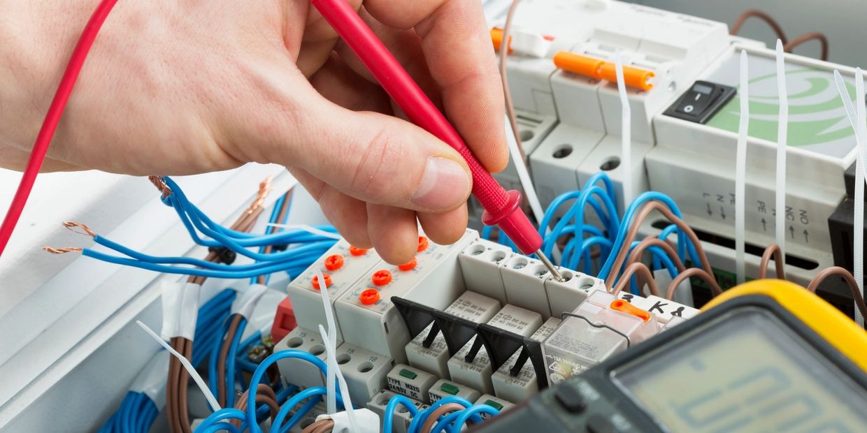 Electrician testing a circuit.