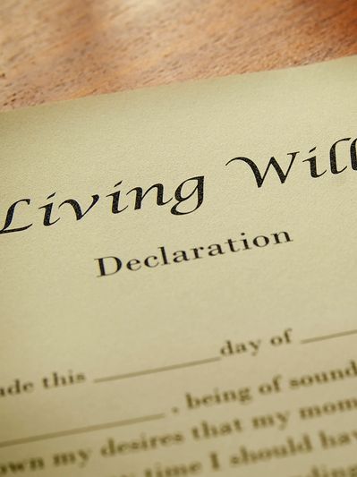 Close-up of a Living Will Declaration document on a wooden surface.