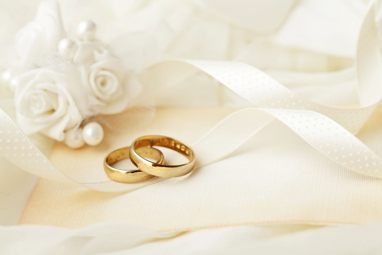 Picture of wedding rings and flowers