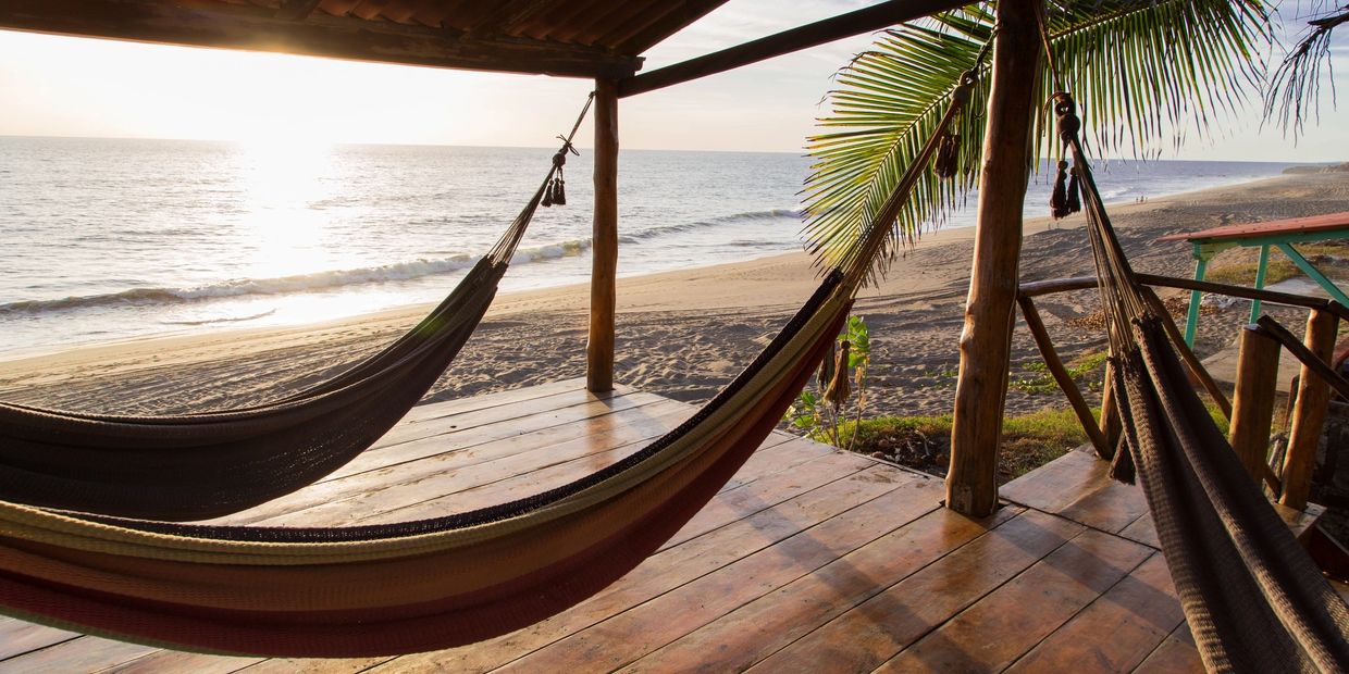 Relaxing in a hammock on the beach