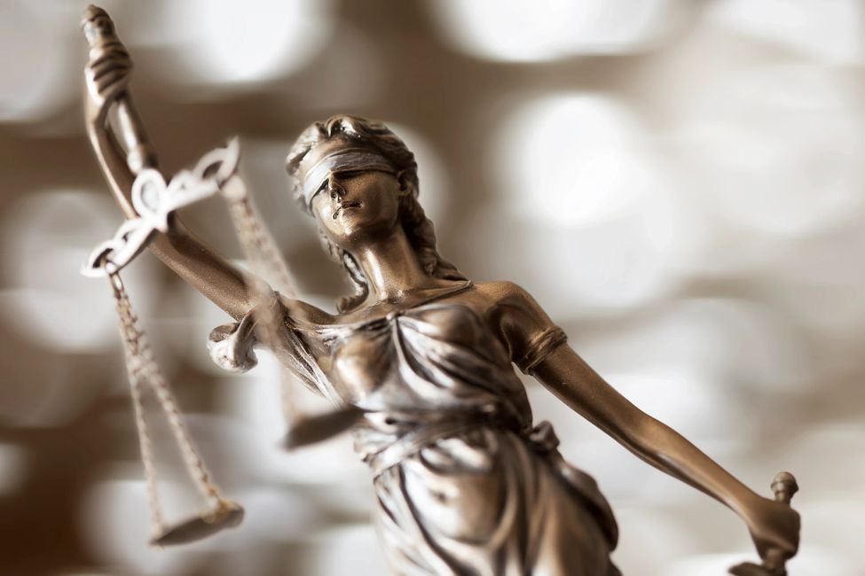 Lady Justice with blindfold, holding the scales of Justice!