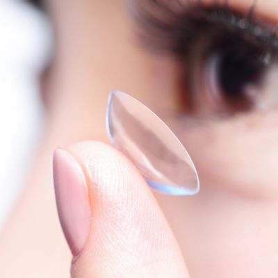 alt = "A contact lens before insertion during a contact lens fitting"