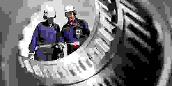 Two workmen talking.