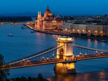 Bridge overlooking beautiful river in European vacation 