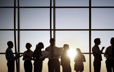 Business meeting in front of a window