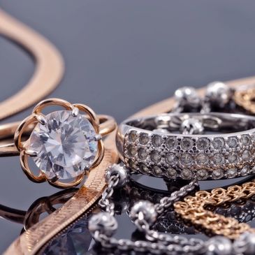 Gold and silver jewelry Diamonds 
Fine Jewelry- Gold Precious & Semiprecious Watches Costume Jewelry