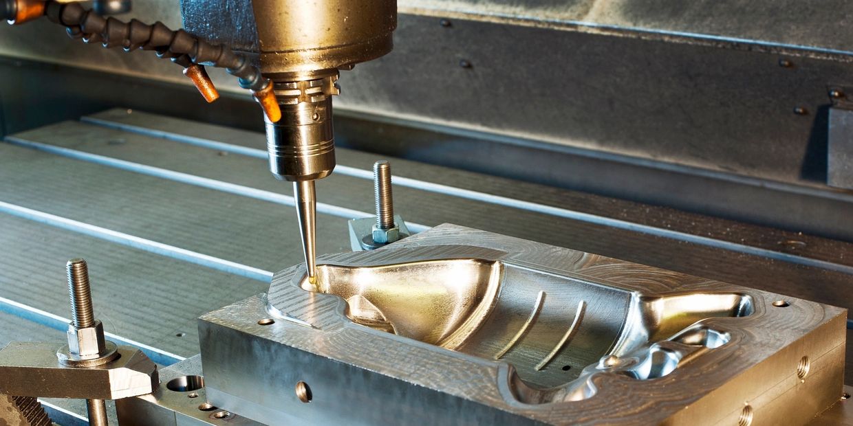 CNC machine creating a mold. 