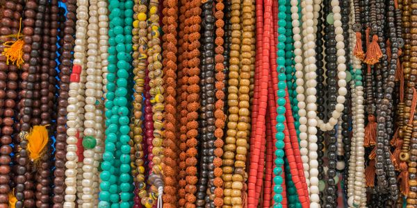 Colorful beads on strings.