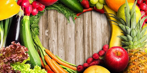 Heart shape made with fruits and vegetables